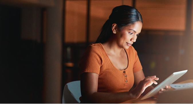 Woman using tablet device