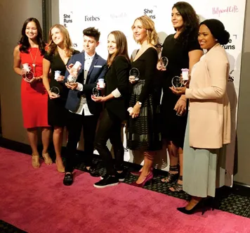 Nancy H. poses with fellow GenNext "She Runs it" honorees.