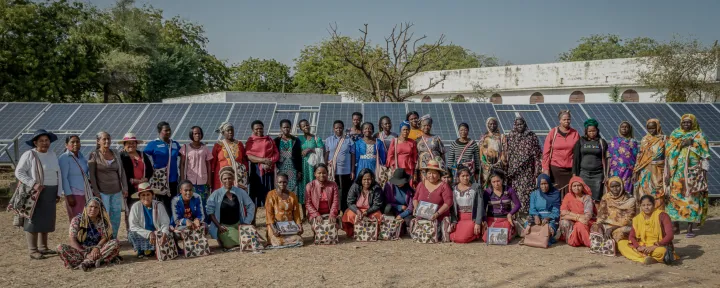 Photo showing a large group of BCI solar engineers, called 'solar mamas'